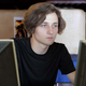The man of virtually limitless power, who can bend the world to his will whenever he chooses, kills time on an online MMA forum waiting for his roommate to get out of the shower.